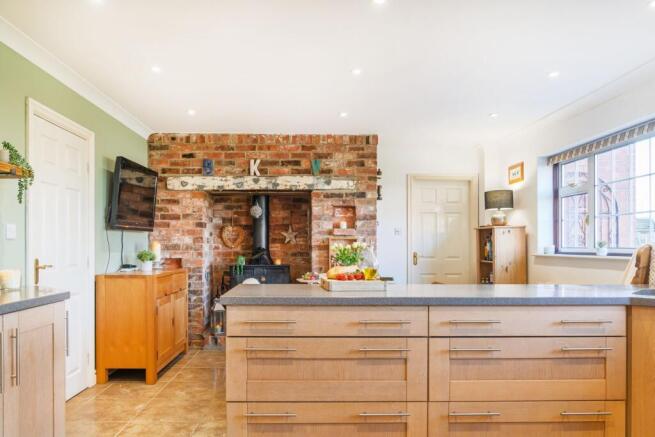 Shaker-Style Kitchen With Corian Worktops