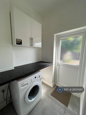 Utility Room With Access To Shower Room 
