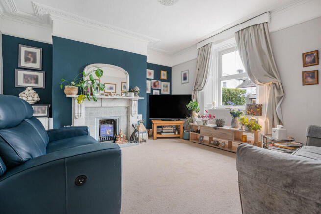 Sitting Room with Original Coving + Fireplace