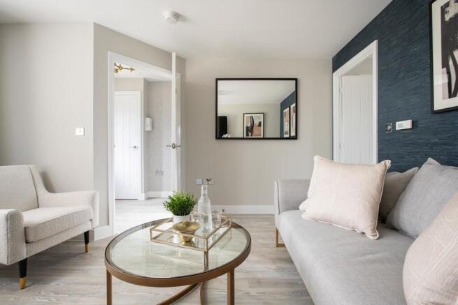 A bright living room where you will love to relax in and catch up with family and friends