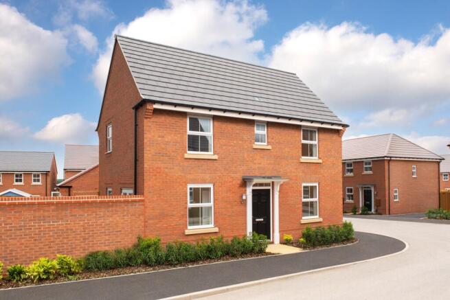 outside view of a detached 3 bedroom home with private walled garden