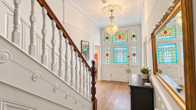 Victorian Hallway with Stained Glass Door.png