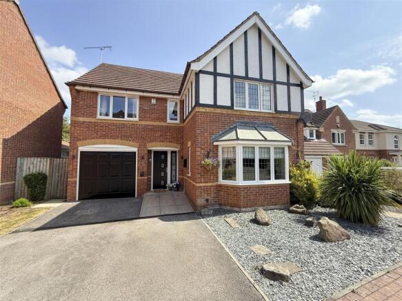 DRIVEWAY AND FRONT GARDEN