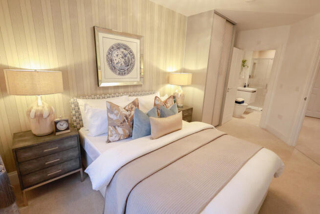 a bedroom with lamps