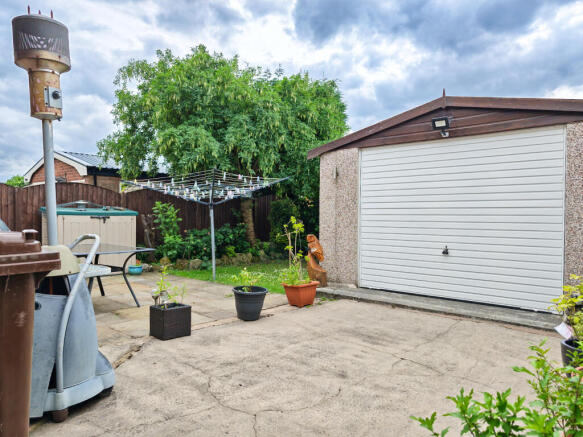GARAGE AND REAR GARDEN 