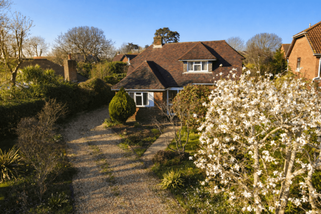 A detached family home set on a plot extending to