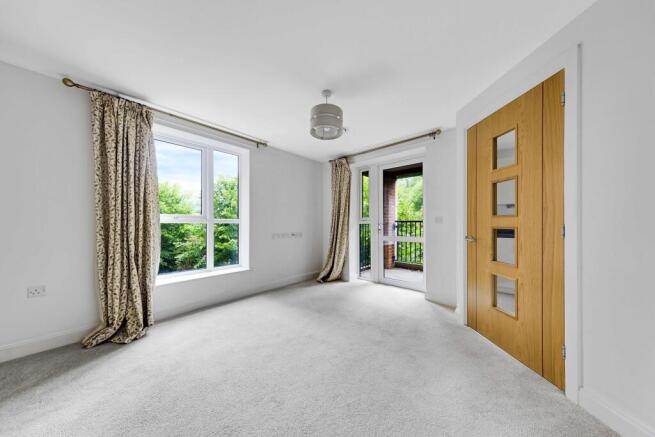 a room with a door and windows