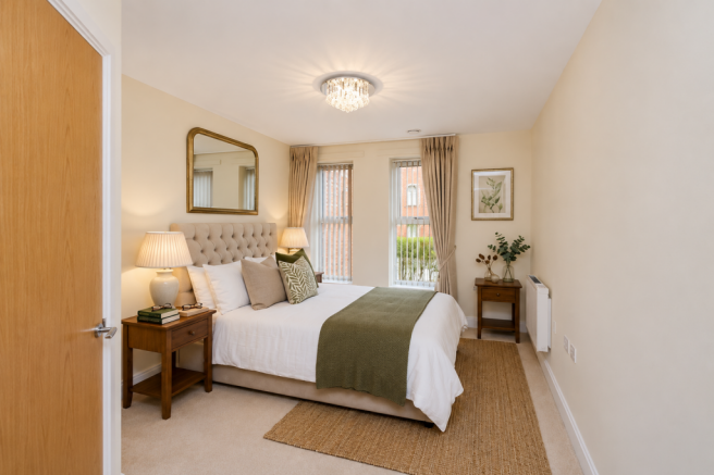 a bedroom with a large bed