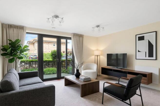 a living room with a large glass door