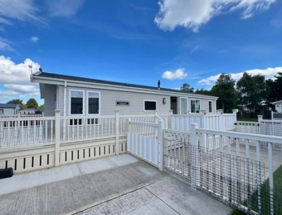 Front Entrance And Large Wraparound Decking At The