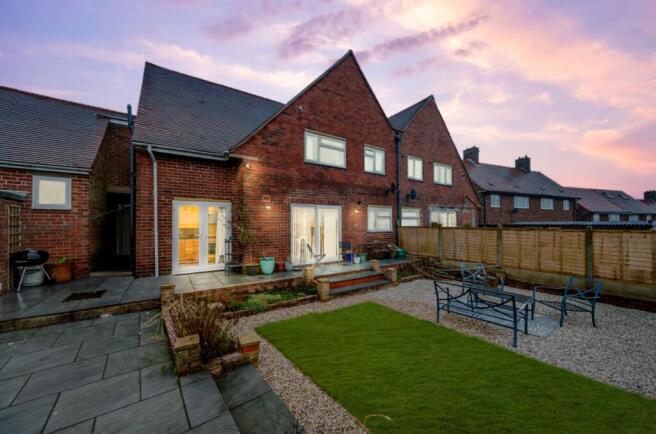 Dusk View Of The Rear Of The Property