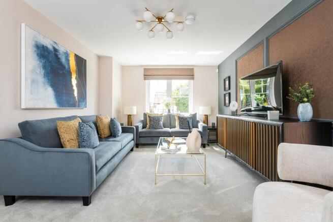 The cosy living room is to the front of the home