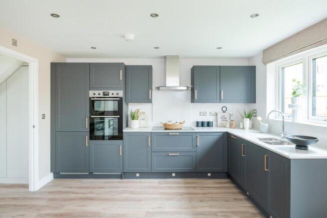 There's ample storage and worktop space in the modern kitchen