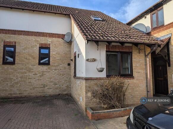 Front Of The House With The Parking Space