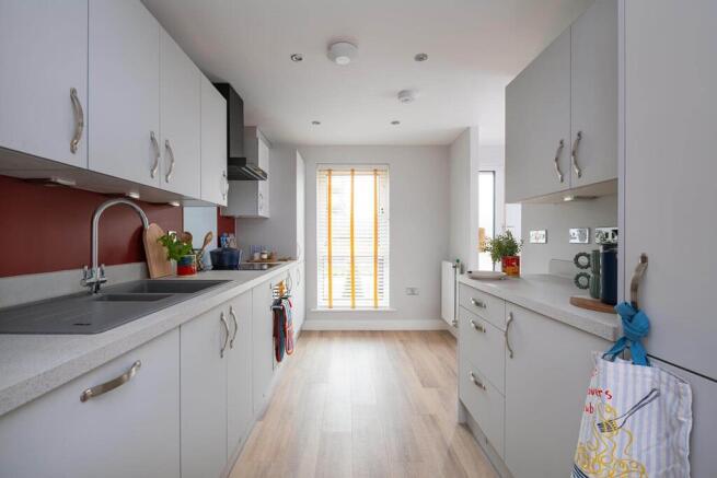 An open plan, modern kitchen is brand new from the day you move in