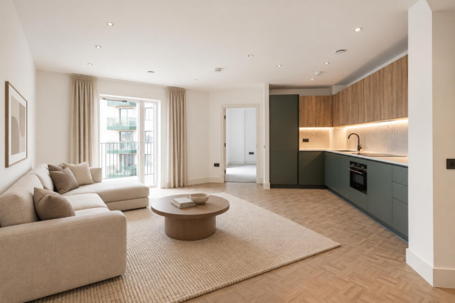 Warm Minimalist Living Room with Green Kitchen.png