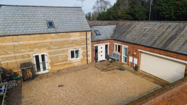 A driveway providing parking but also a courtyard