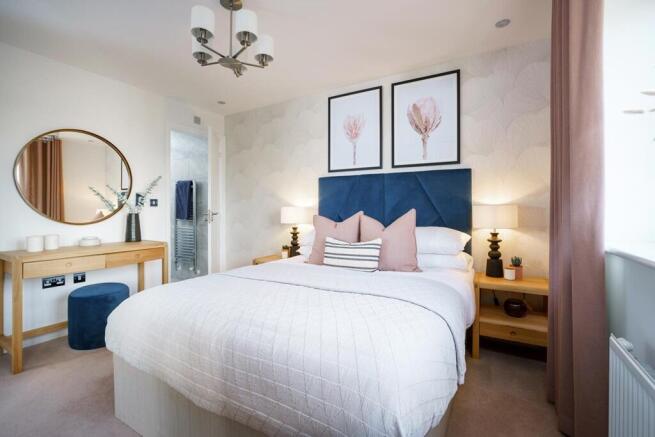 King-size bedroom with en suite shower room