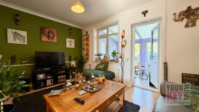 Living room with garden doors at Thirlestane in Hy