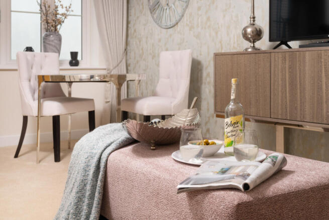 a table with a basket and chairs
