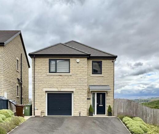 EXTERNAL FRONT, GARAGE AND DRIVEWAY