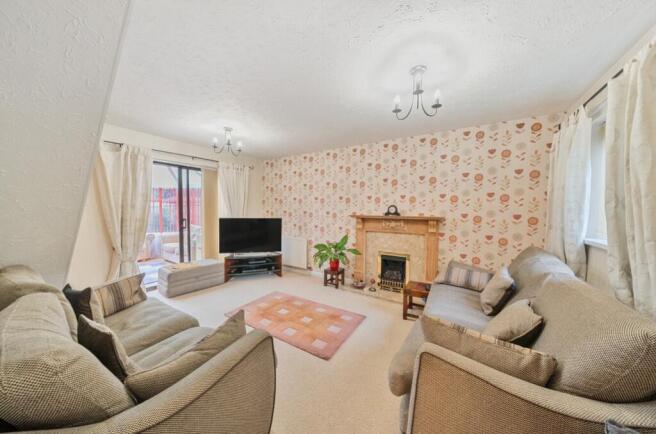 Living Room With Doors To Coservatory