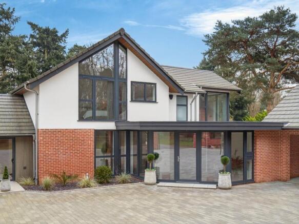 Luxury contemporary detached house with floor-to-c