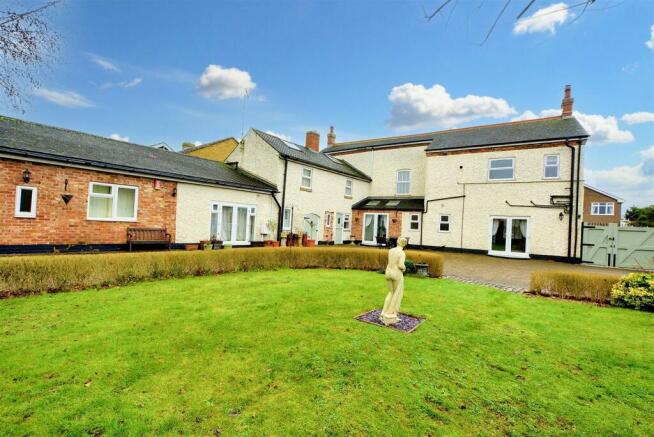 Private established gardens with seating areas and