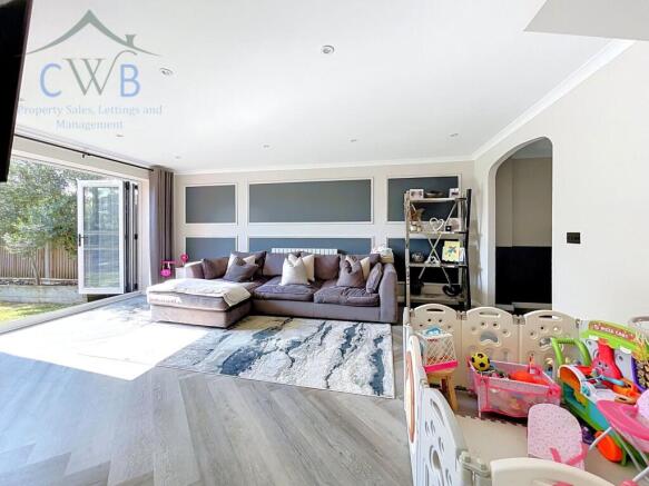 Large open living room with bifolds to garden