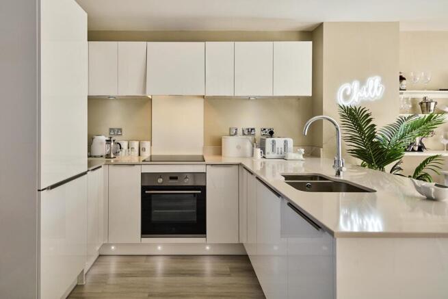 Integrated appliances give the kitchen a clean look