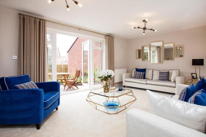 French doors from the lounge to the rear garden bring the outside in