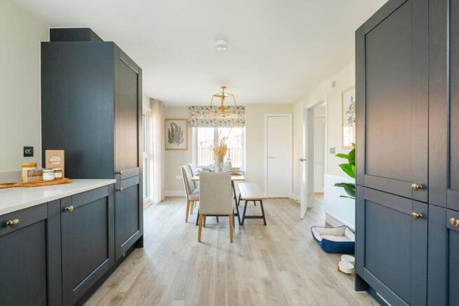 The dining area lead from the kitchen through double doors to the garden