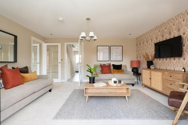 The living room offers plenty of space for the whole family to relax and get together