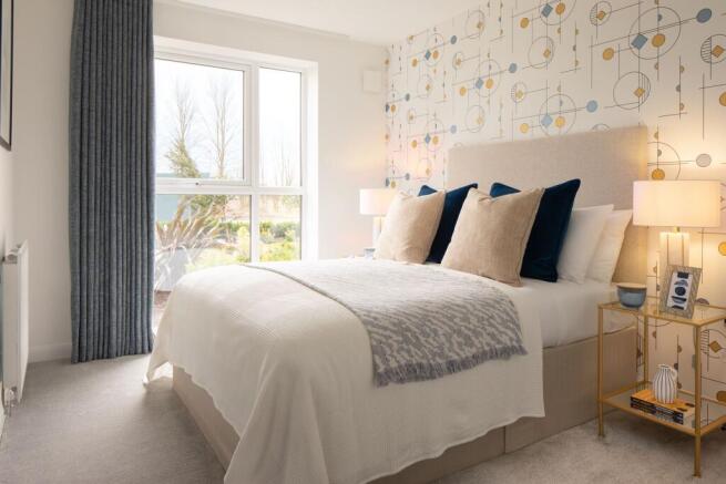 En suite main bedroom in the Coleford 2 bedroom apartment