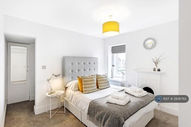 Master Bedroom With Walk-In Closet
