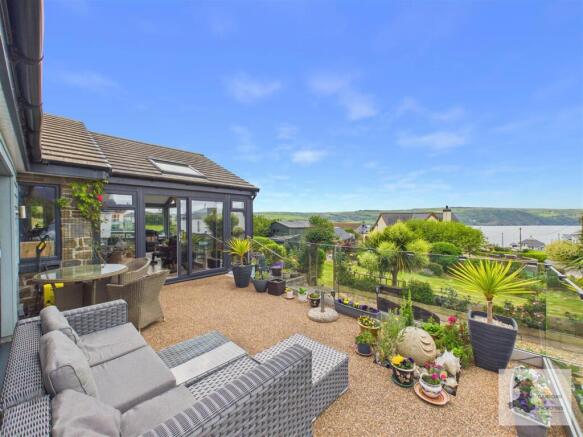 Rear patio and sea views