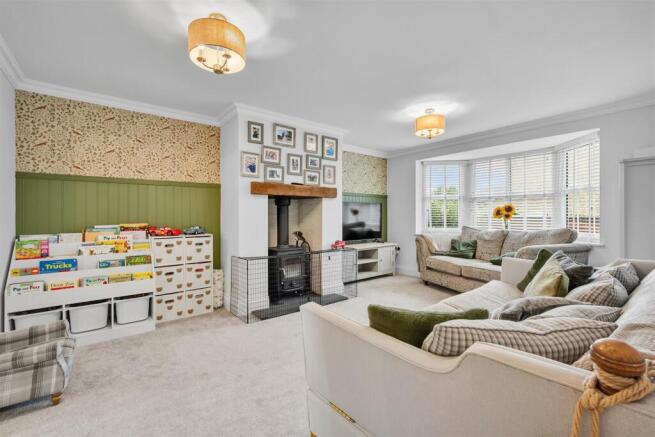 Living Room - fireplace and bay window.jpg