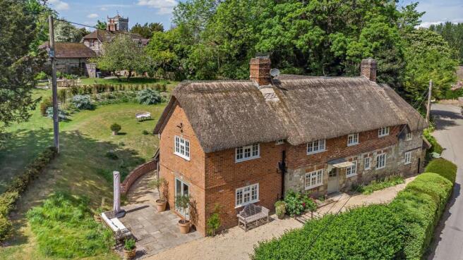 Cottage On The Bank