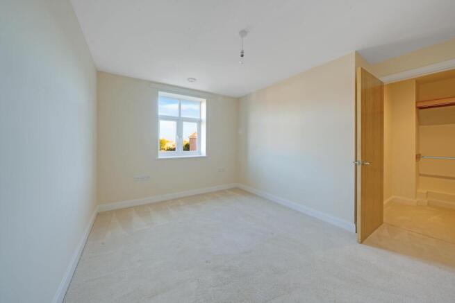 a room with a window and a door