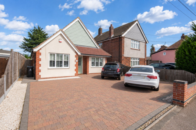 Front elevation + parking