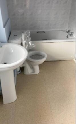Bathroom Bath with overhead shower