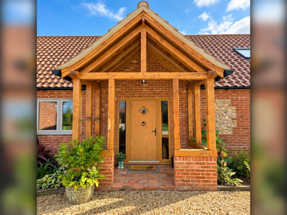 Warm Timber-Framed House Entrance.png