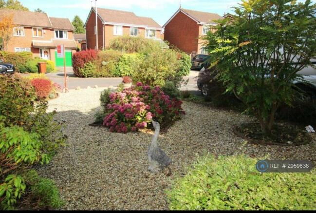 View Of The Fashionably Landscaped Front Garden