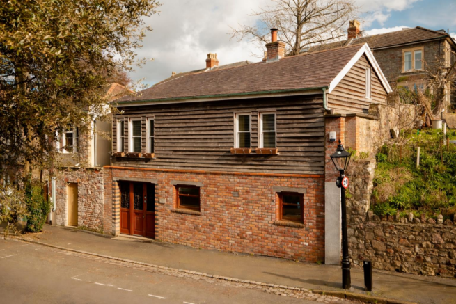 Charming rustic two-story cottage.png
