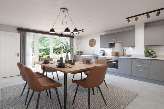 A modern kitchen with French doors opening to the rear garden