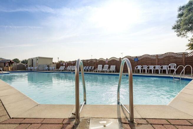 Outdoor swimming pool at Winchelsea Sands Holiday