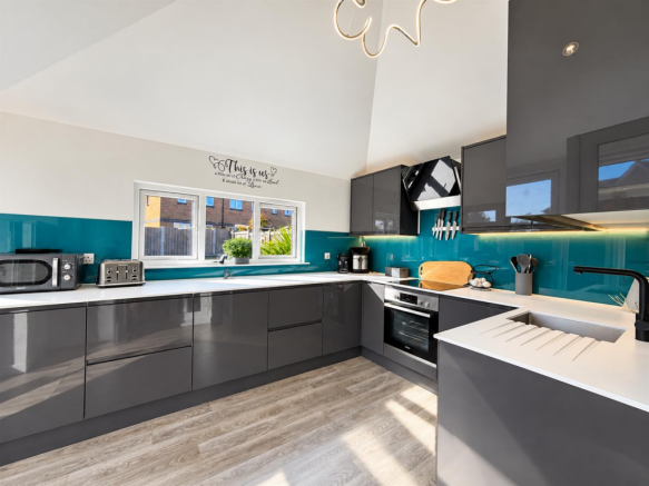 Bright Contemporary Teal-Accented Kitchen.png