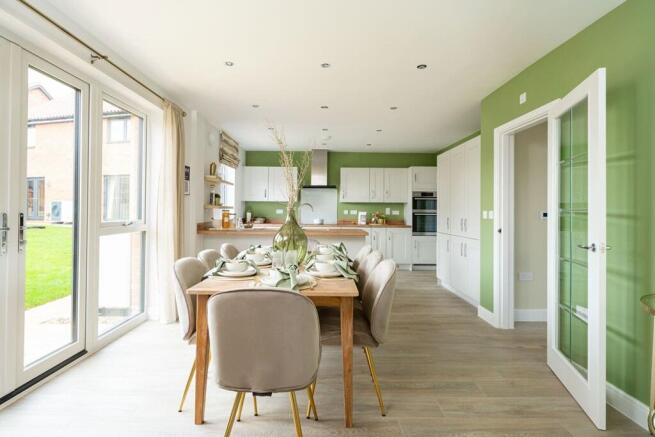 The kitchen/dining area is a wonderful space for both family mealtimes and entertaining