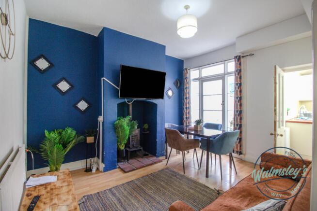 Rear dining room with French doors to garden