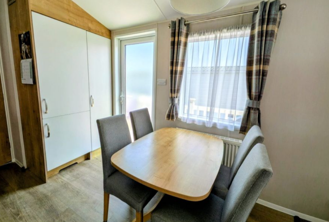 Dining area inside Willerby Avonmore holiday home 